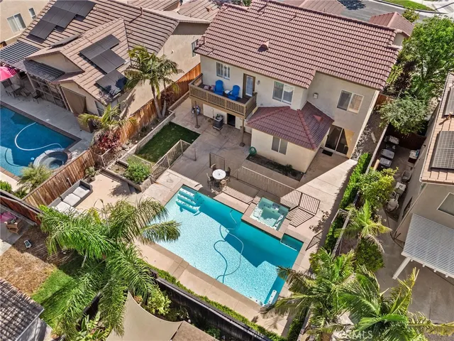 an aerial view of a house with a garden