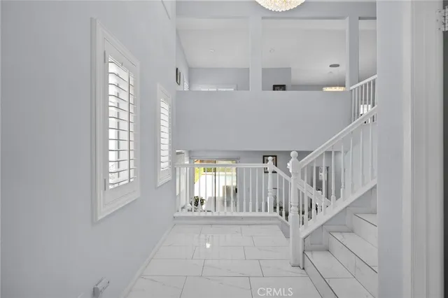 a view of entryway and hall with a window