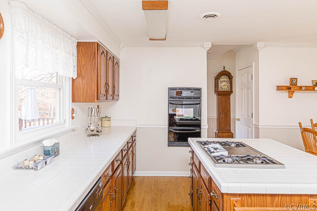 18162 Teman Road Beaverdam, VA 23015 - Photo 12 of 47 a kitchen with stainless steel appliances granite countertop a sink stove and refrigerator
