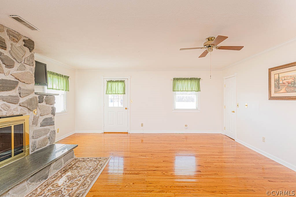 18162 Teman Road Beaverdam, VA 23015 - Photo 18 of 47 a view of empty room with wooden floor and fan