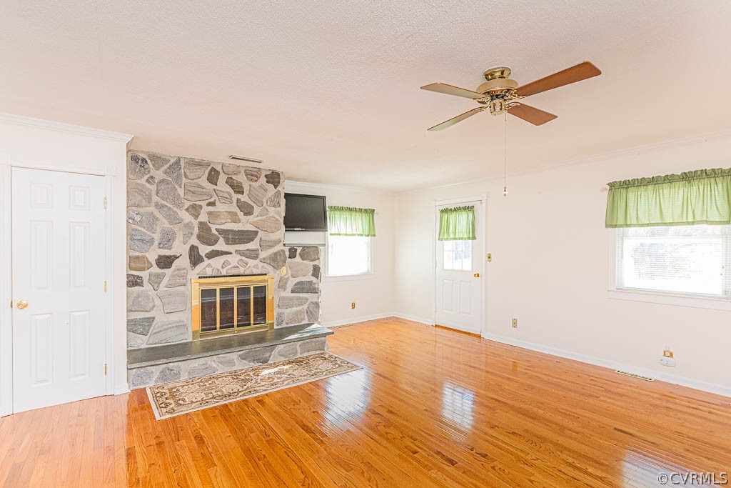 18162 Teman Road Beaverdam, VA 23015 - Photo 19 of 47 a view of a livingroom with wooden floor and a ceiling fan