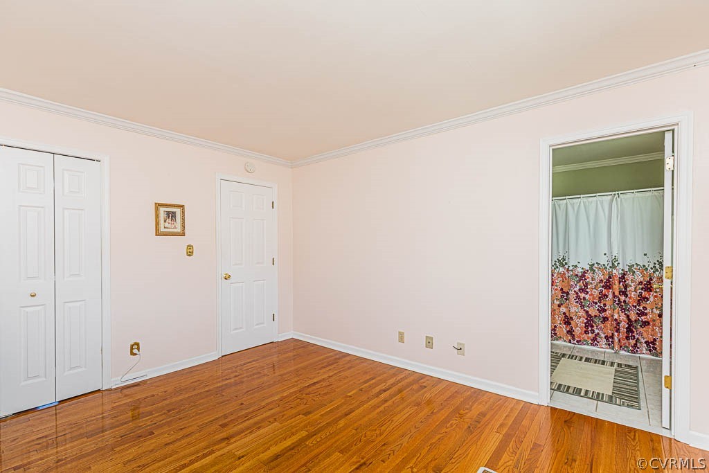 18162 Teman Road Beaverdam, VA 23015 - Photo 28 of 47 a view of room with window and wooden floor