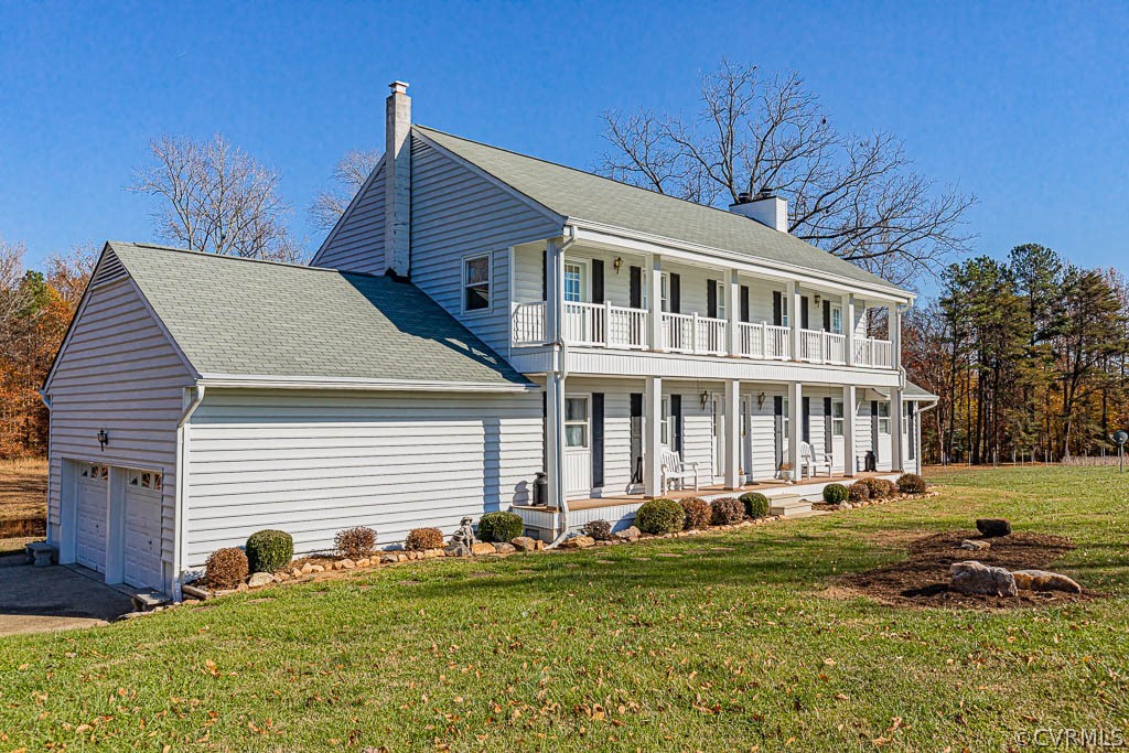 18162 Teman Road Beaverdam, VA 23015 - Photo 3 of 47 a front view of a house with a yard