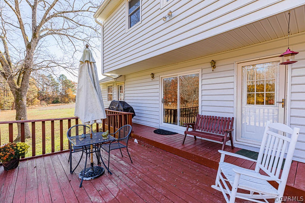 18162 Teman Road Beaverdam, VA 23015 - Photo 33 of 47 a balcony with wooden floor outdoor seating and wooden floor