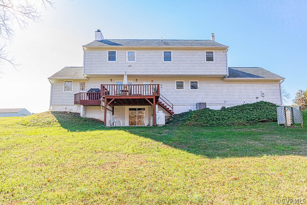 18162 Teman Road Beaverdam, VA 23015 - Photo 38 of 47 a view of a house with a yard and sitting area