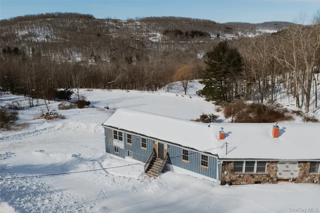 a view of a terrace with a snow on the road