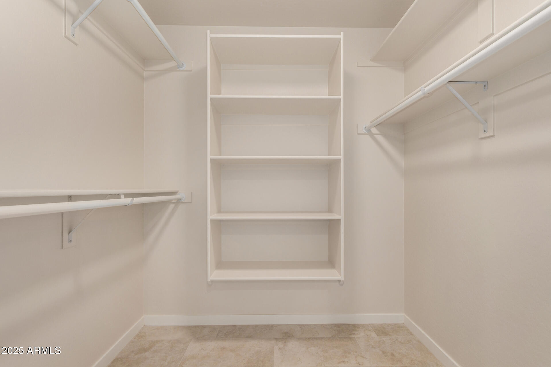 20375 West Carver Road Buckeye, AZ 85326 - Photo 25 of 44 a view of an empty walk in closet