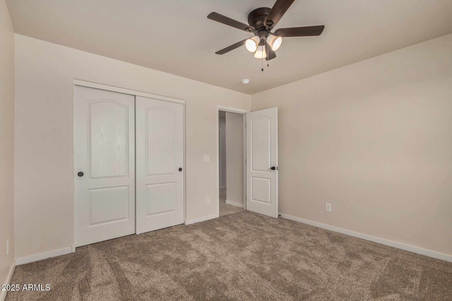 20375 West Carver Road Buckeye, AZ 85326 - Photo 32 of 44 a view of a big room with chandelier fan
