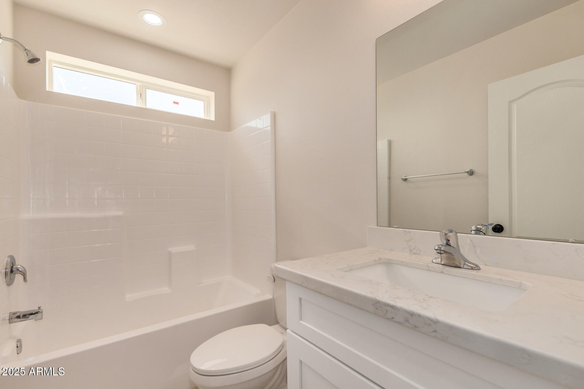 20375 West Carver Road Buckeye, AZ 85326 - Photo 33 of 44 a bathroom with a granite countertop sink toilet and shower
