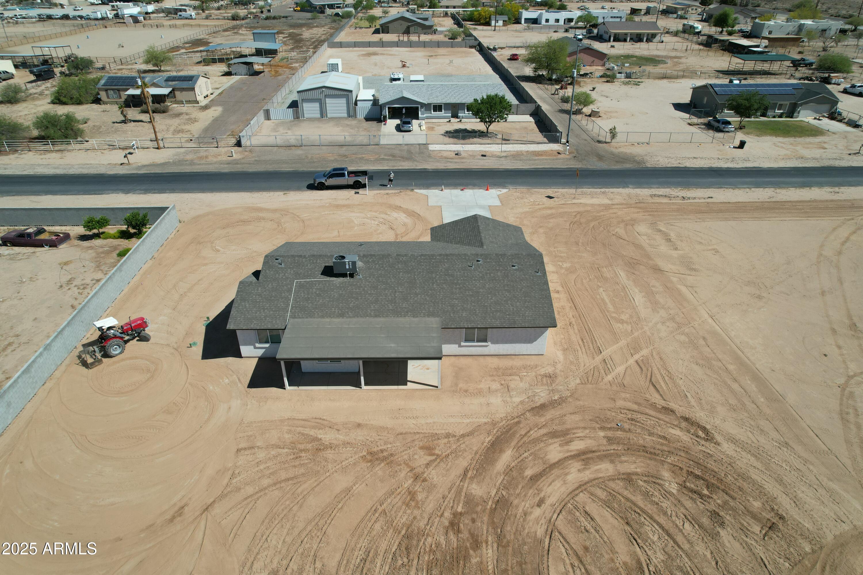 20375 West Carver Road Buckeye, AZ 85326 - Photo 40 of 44 an aerial view of a house with a yard