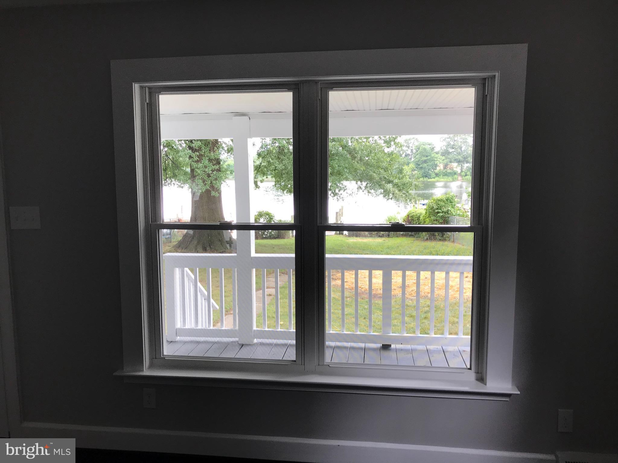 7530 East Battle Grove Road Dundalk, MD 21222 - Photo 15 of 27 a view of a window and front view of a house