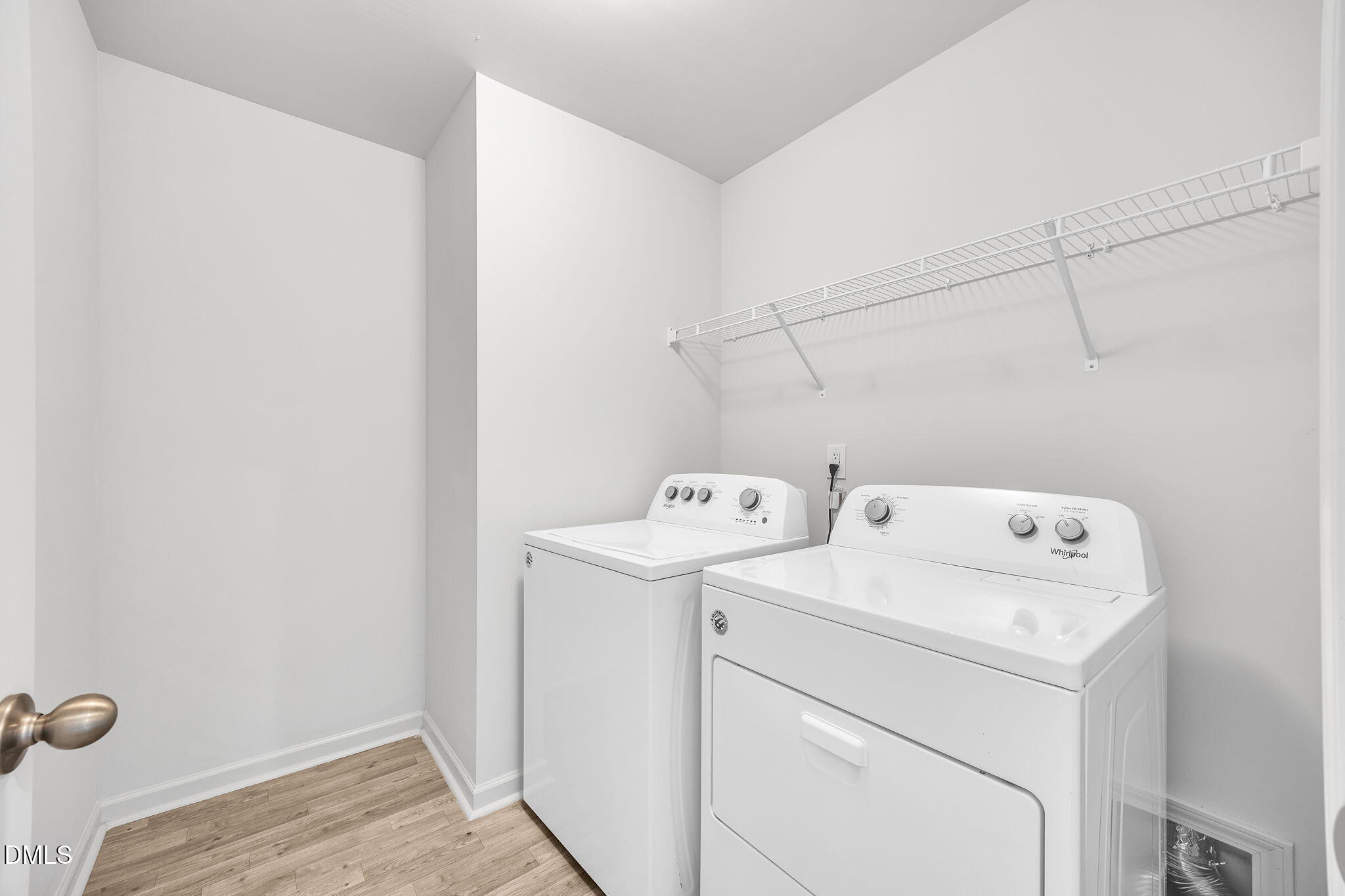 177 Yellowwood Avenue Spring Hope, NC 27882 - Photo 21 of 31 a view of storage and utility room with washer and dryer
