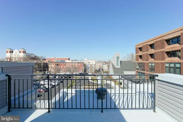 a view of a balcony with city view