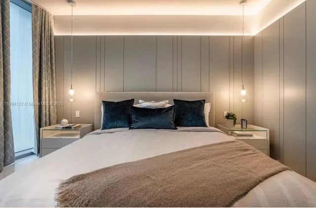a view of a kitchen with a table and chairs