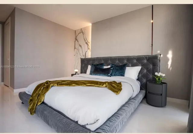a kitchen with a counter space a sink appliances and cabinets