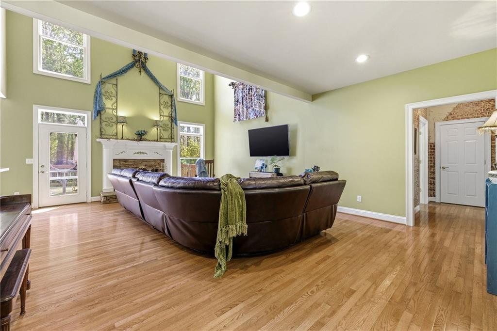 4829 Old Pendergrass Road Jefferson, GA 30549 - Photo 13 of 55 a living room with furniture and a flat screen tv