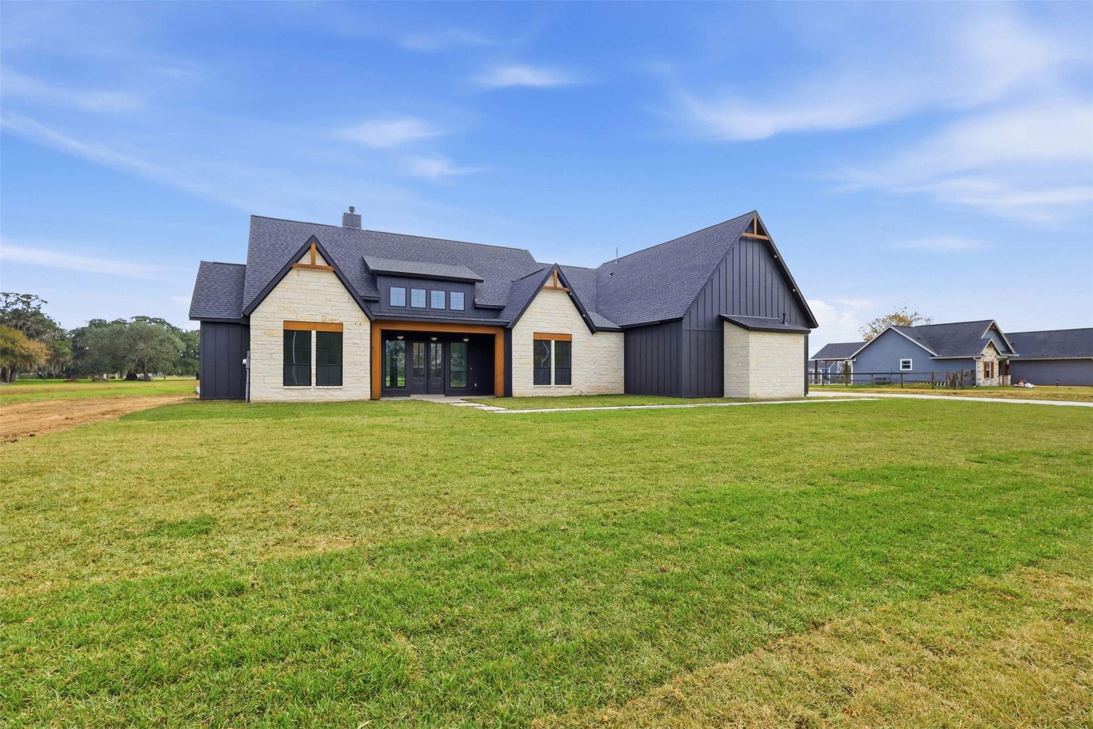 467 Springfield Drive Angleton, TX 77515 - Photo 2 of 42 a front view of house with yard and green space