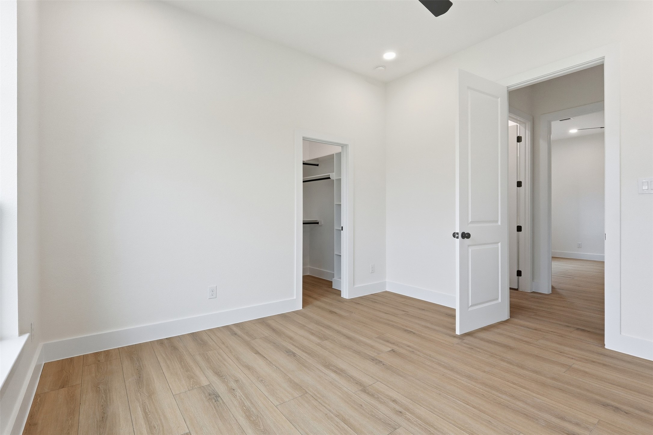 467 Springfield Drive Angleton, TX 77515 - Photo 26 of 42 wooden floor in an empty room with wooden floor