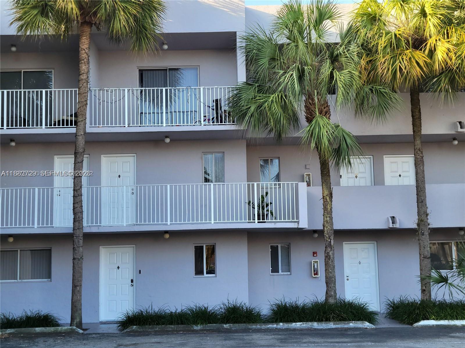 2680 West 76th Street, Unit 204 Hialeah, FL 33016 - Photo 11 of 14 a front view of house with yard