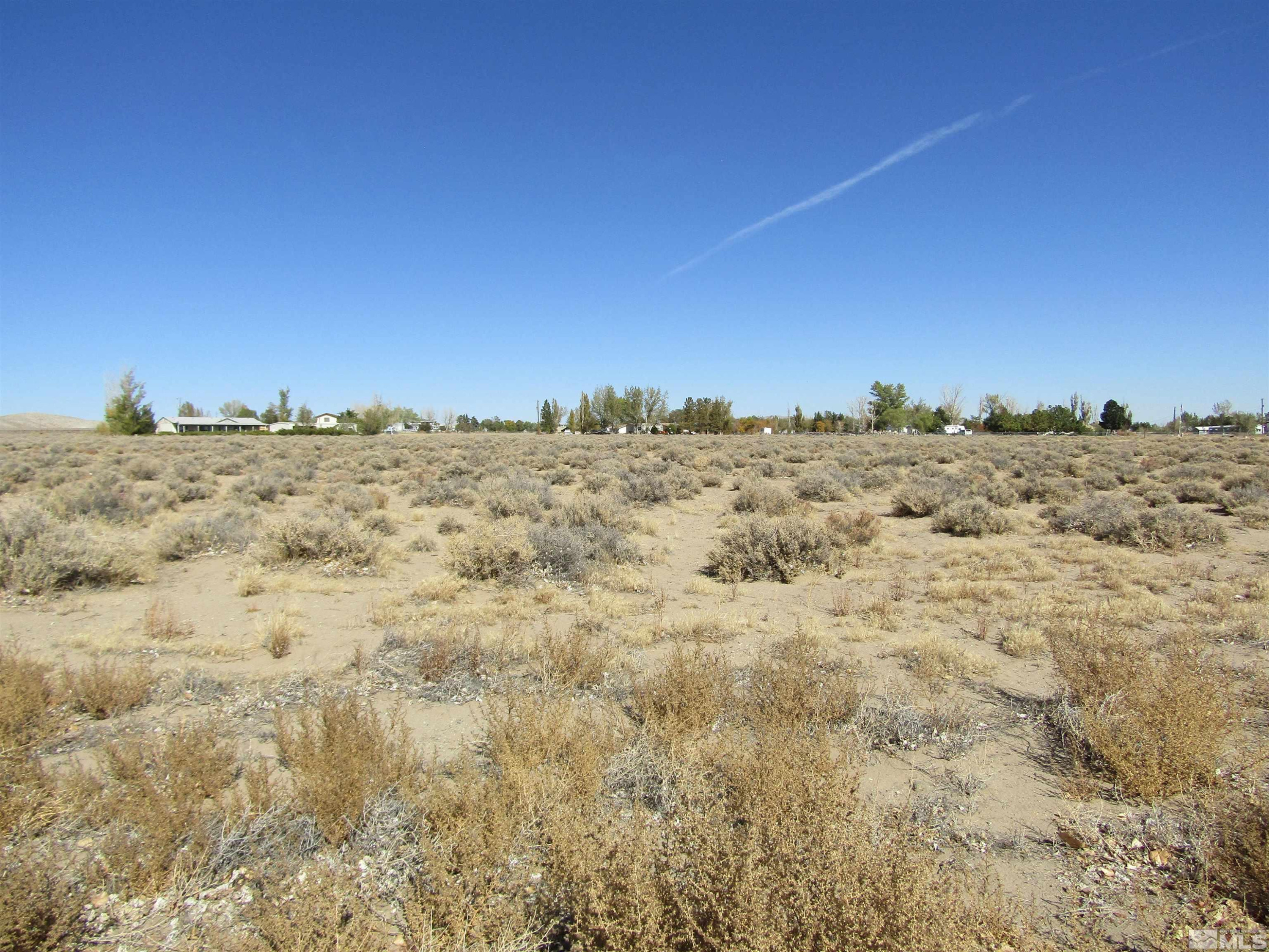 14 Mand Chris Drive Yerington, NV 89447 - Photo 1 of 3 a view of beach and yard