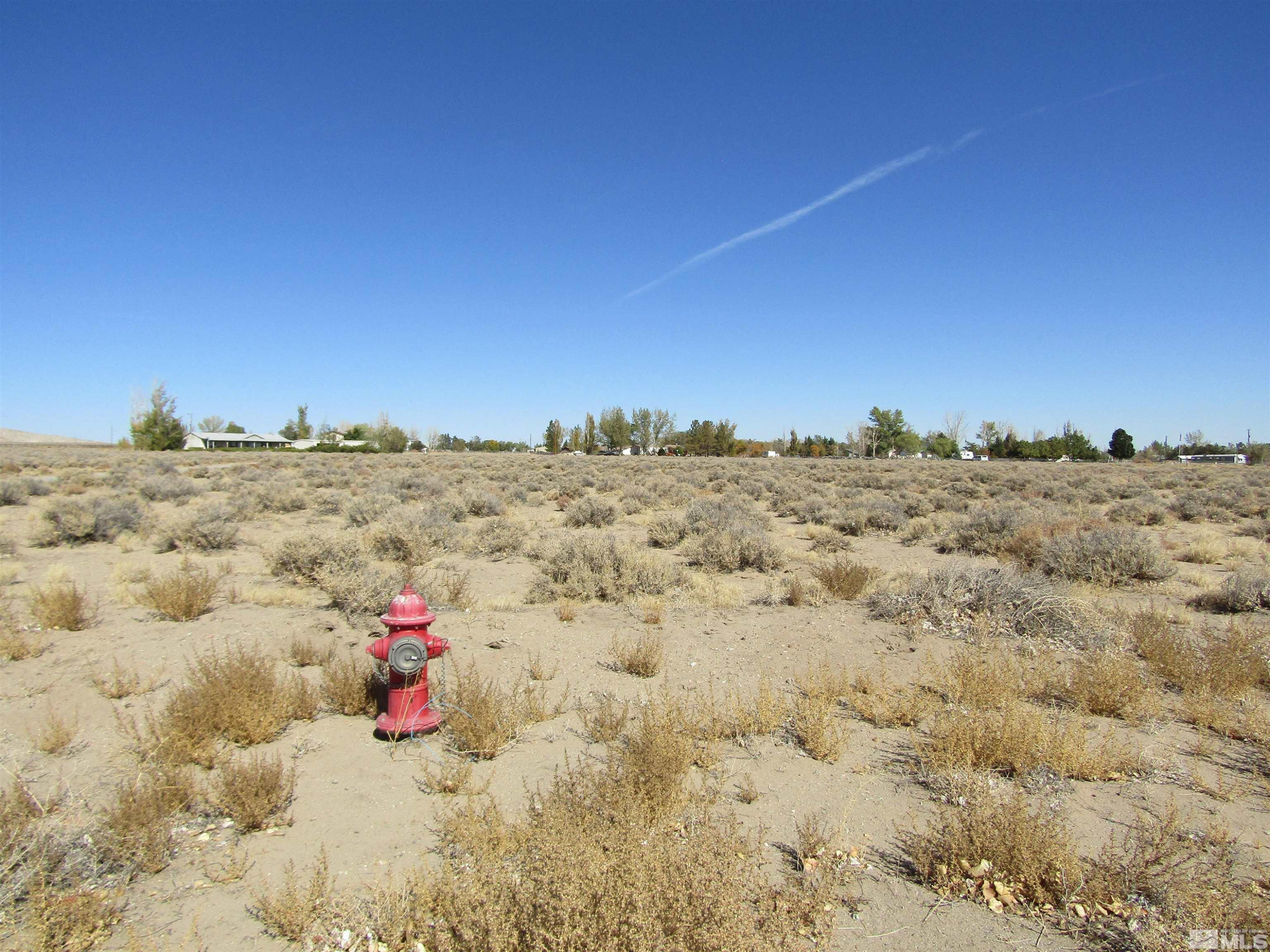14 Mand Chris Drive Yerington, NV 89447 - Photo 2 of 3 a view of a beach with a snow in the background