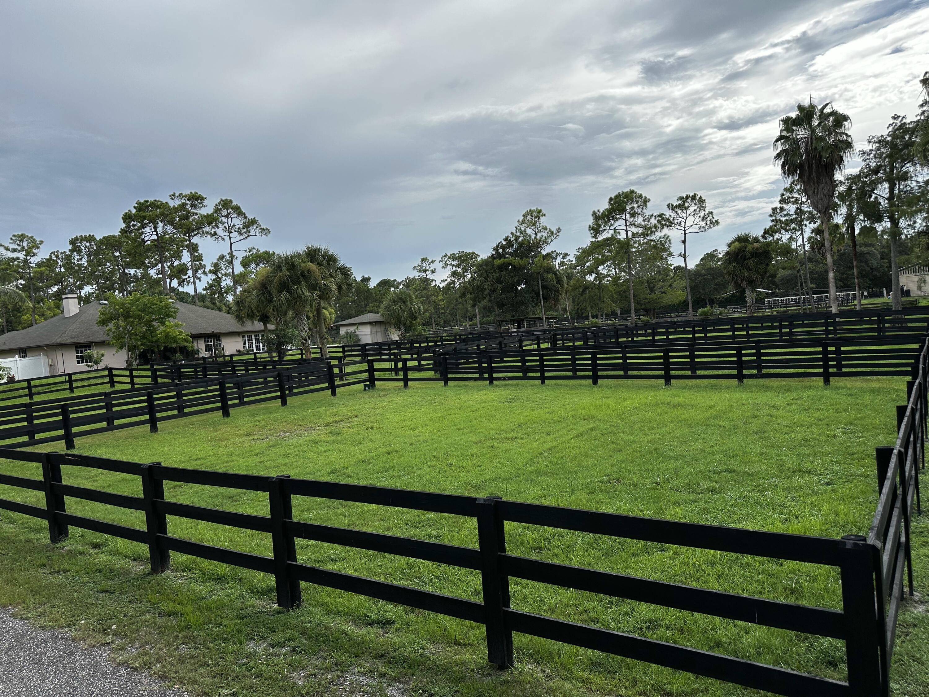 13009 Collecting Canal Road Loxahatchee Groves, FL 33470 - Photo 2 of 3 paddocks