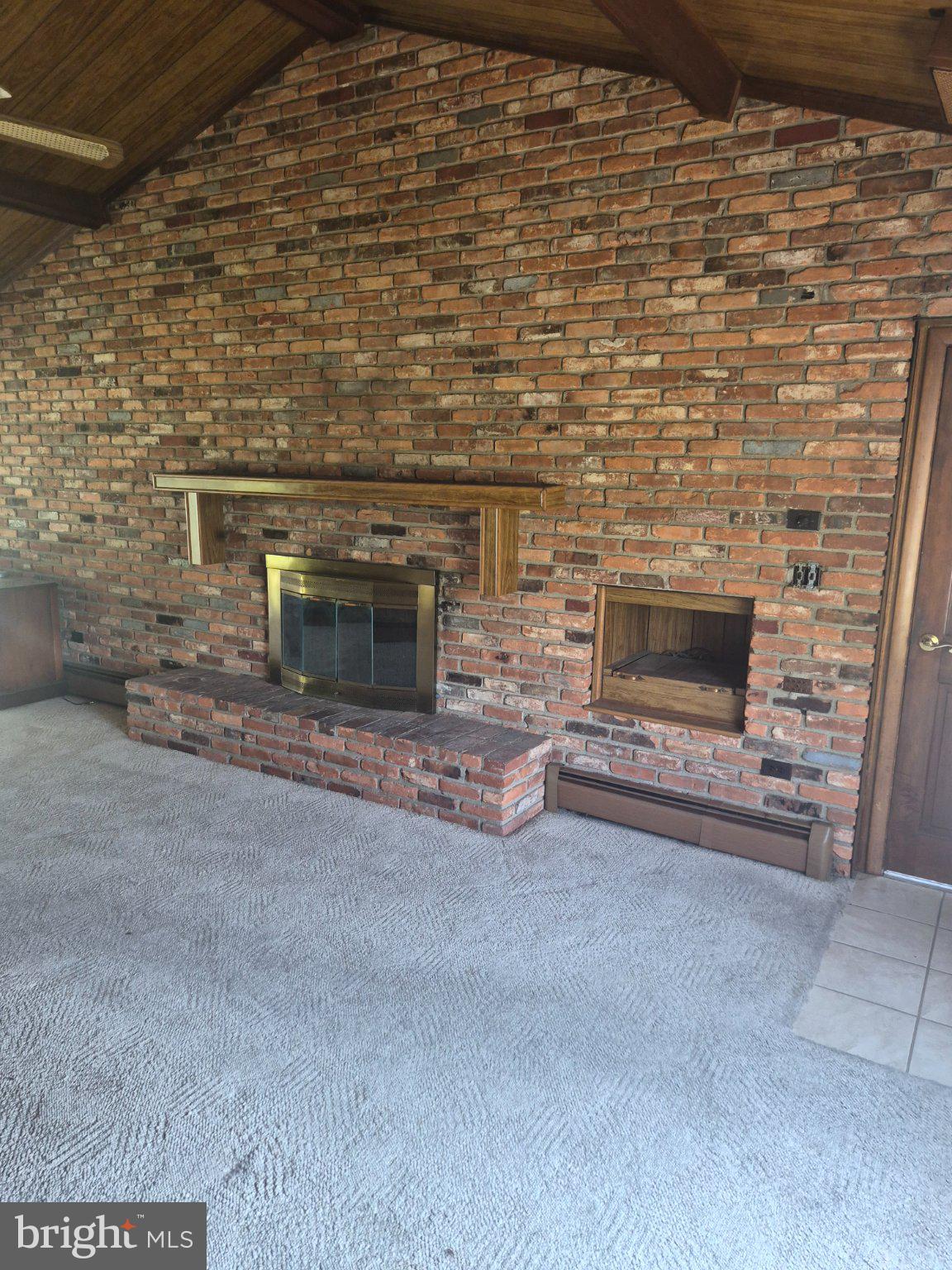 1043 Camp Road Denton, MD 21629 - Photo 2 of 17 Rustic charm with exposed brick walls.