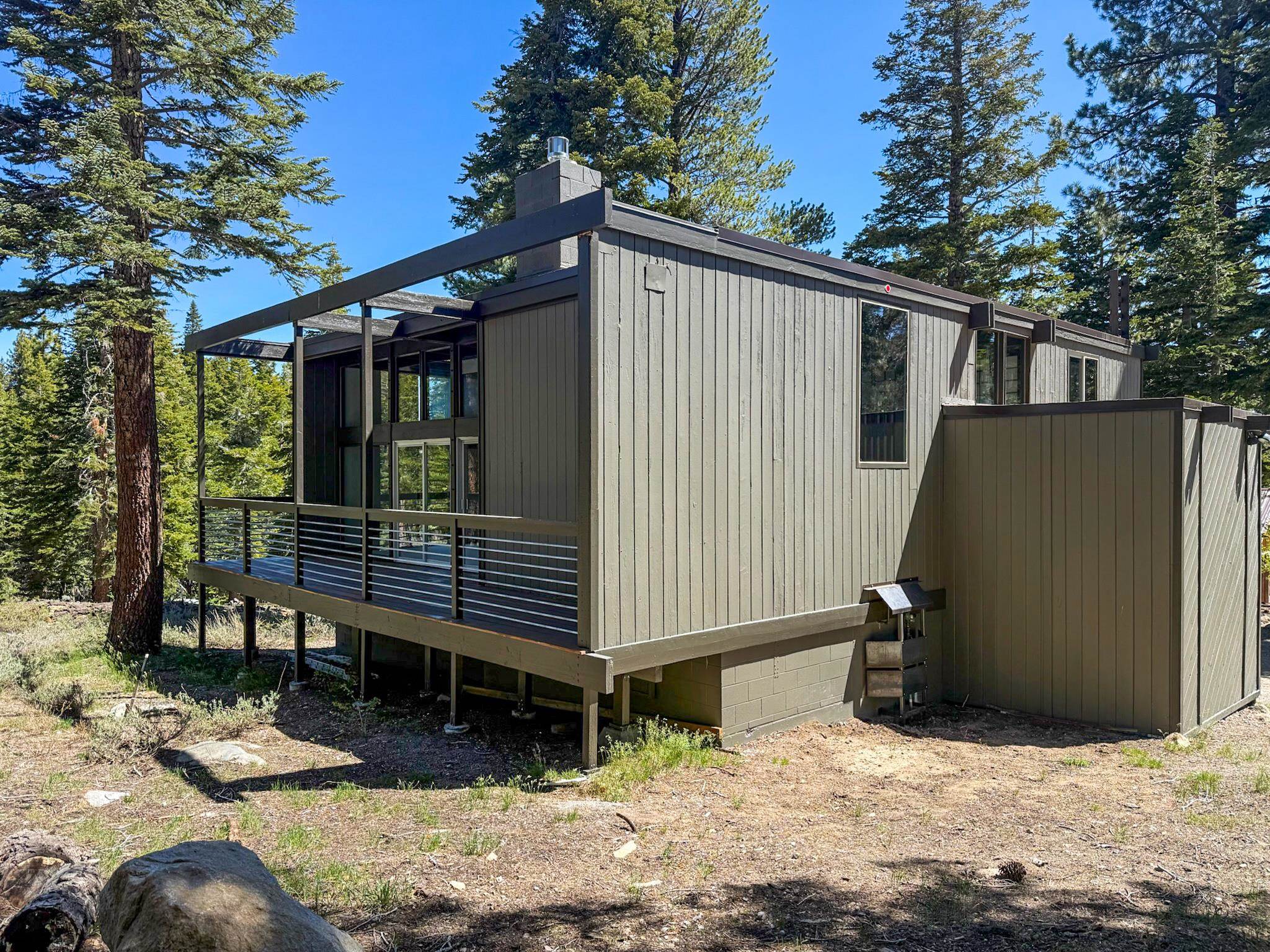 2570 Old Mammoth Road Mammoth Lakes, CA 93546 - Photo 12 of 39 Contemporary architecture with vertical siding and multiple windows