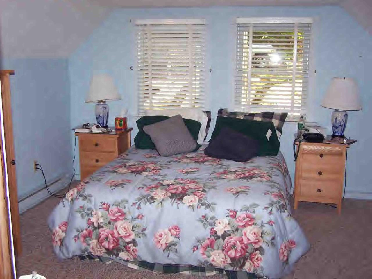 66 Loop Otis, MA 01253 - Photo 14 of 19 a bedroom with a bed and a dresser