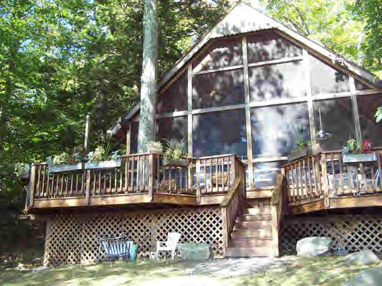 66 Loop Otis, MA 01253 - Photo 3 of 19 a view of a chair and table in the patio