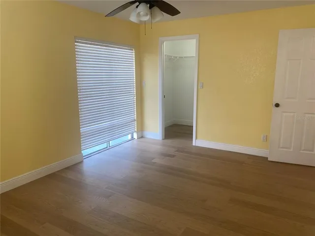 a kitchen with a sink stove and microwave