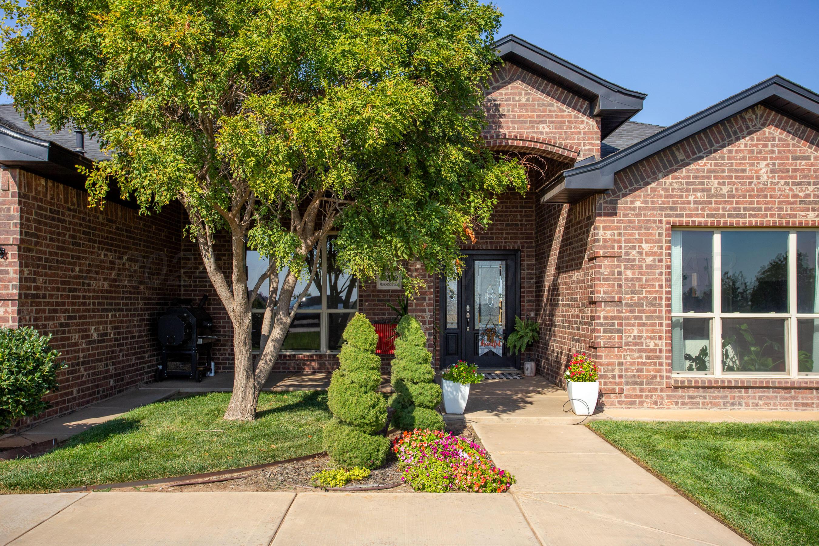 18500 Morning Star Road Bushland, TX 79124 - Photo 2 of 47 a front view of a house with garden