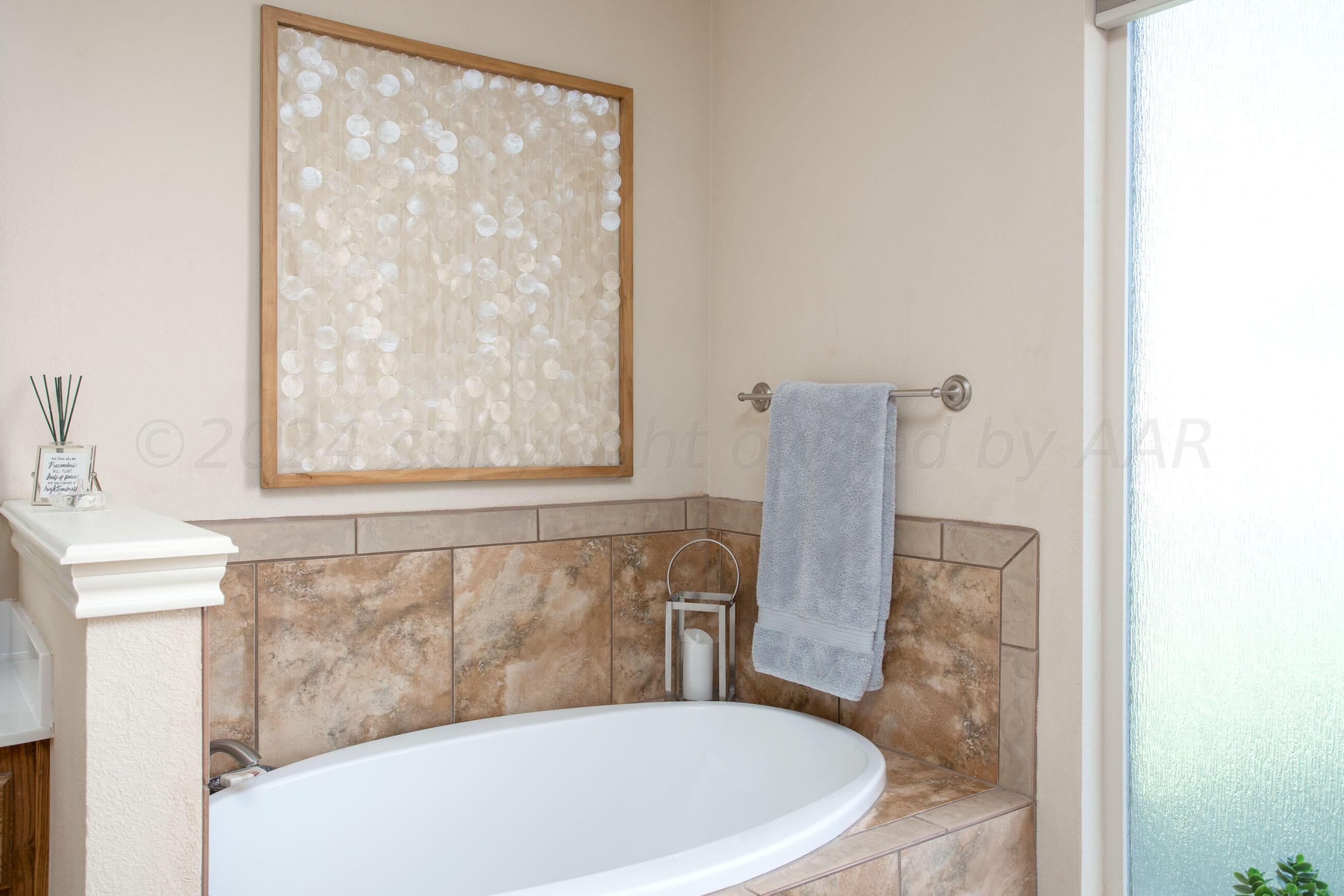 18500 Morning Star Road Bushland, TX 79124 - Photo 23 of 47 a bathroom with a bathtub and shower
