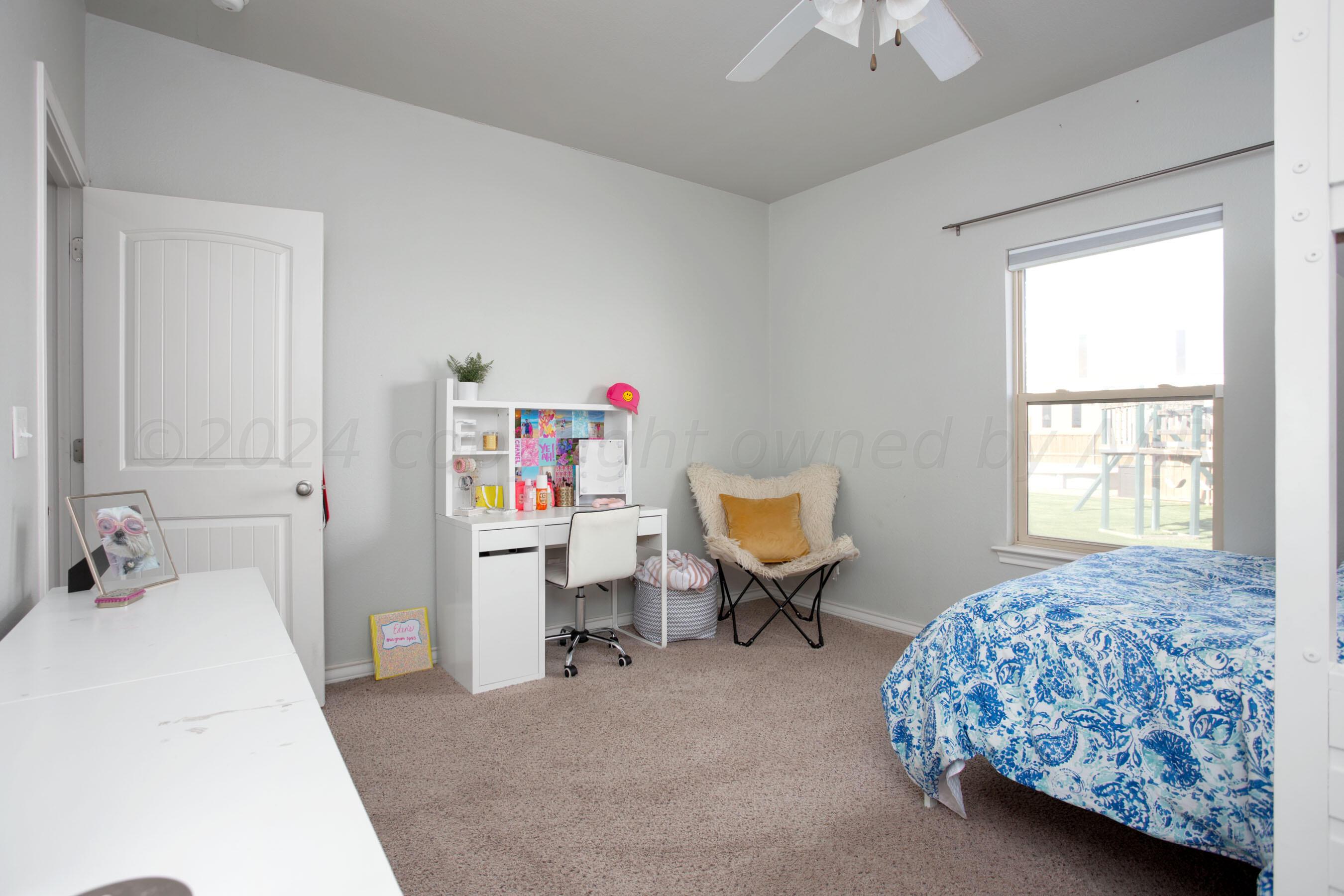 18500 Morning Star Road Bushland, TX 79124 - Photo 30 of 47 a bedroom with a bed and a window