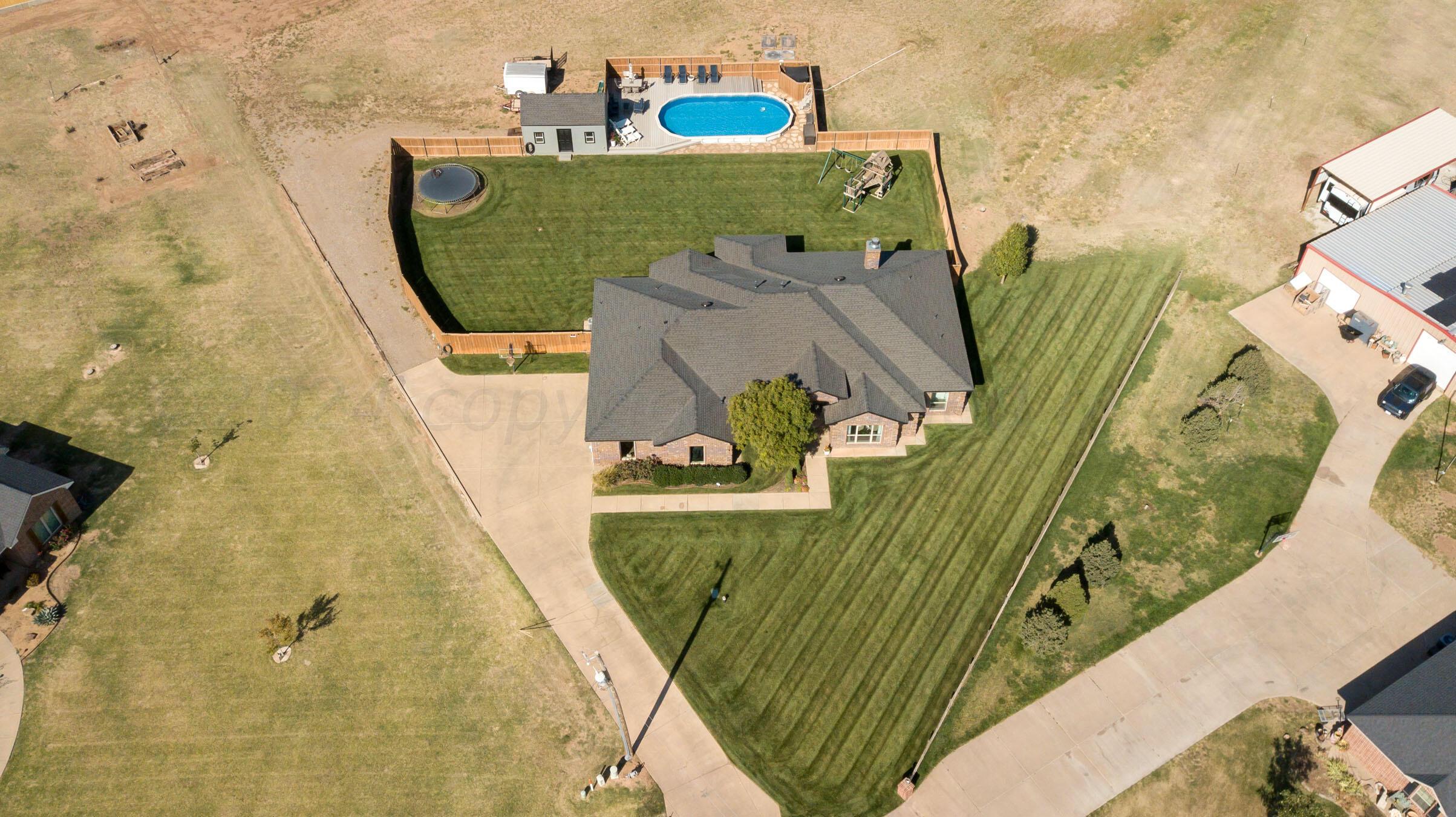 18500 Morning Star Road Bushland, TX 79124 - Photo 3 of 47 an aerial view of a swimming pool