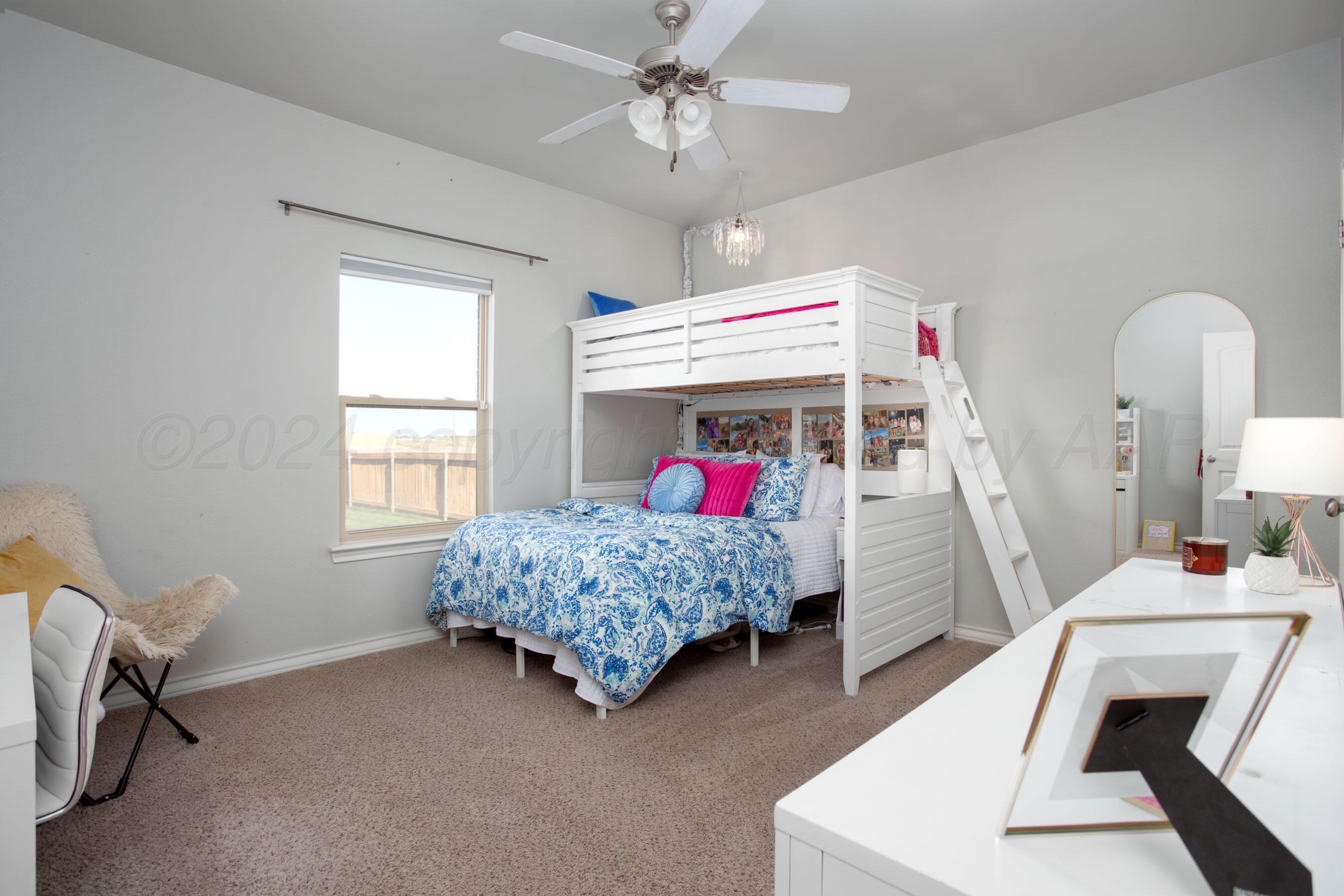 18500 Morning Star Road Bushland, TX 79124 - Photo 31 of 47 a bedroom with a bed and a window