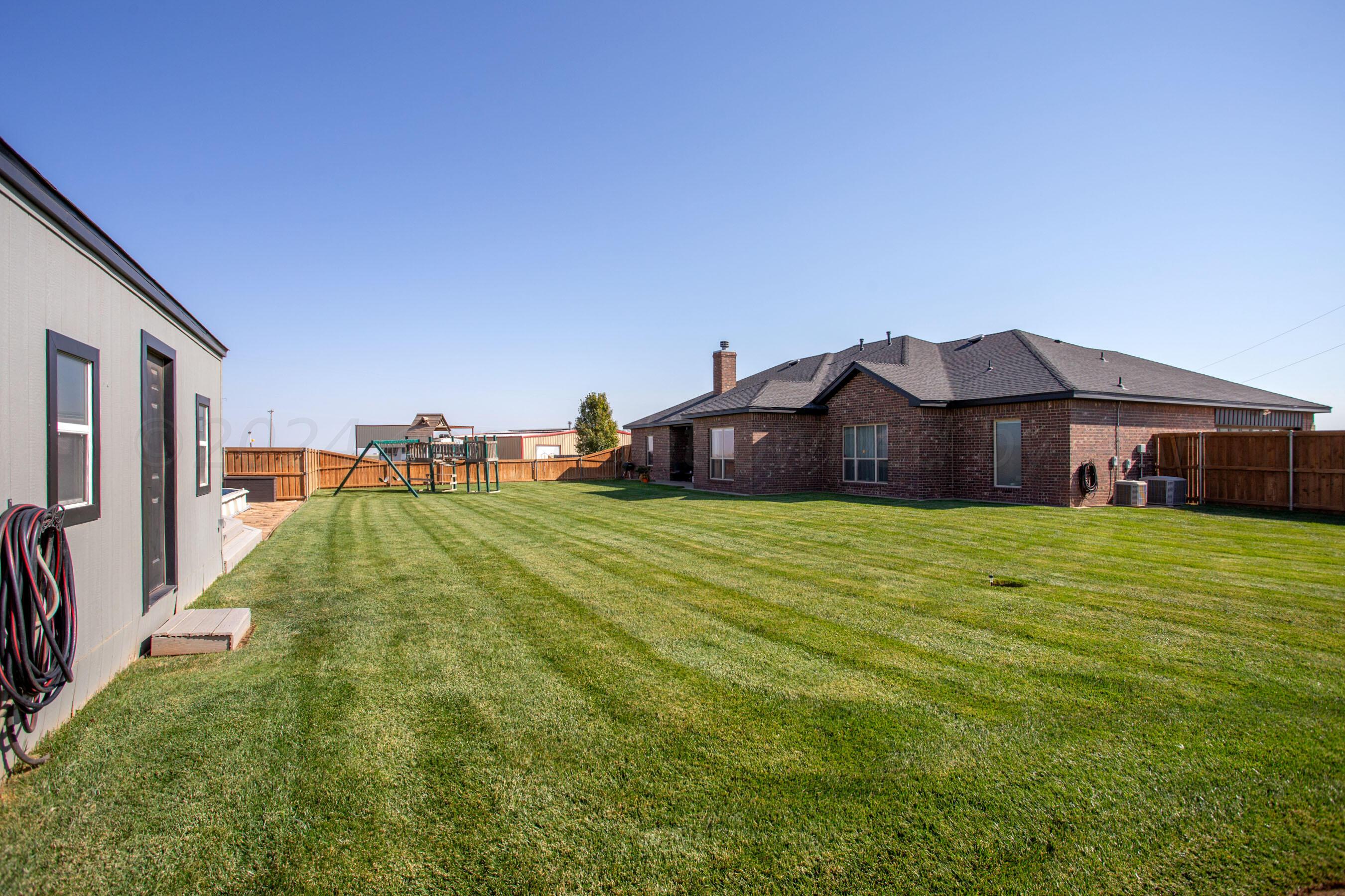 18500 Morning Star Road Bushland, TX 79124 - Photo 40 of 47 a view of a house with a big yard