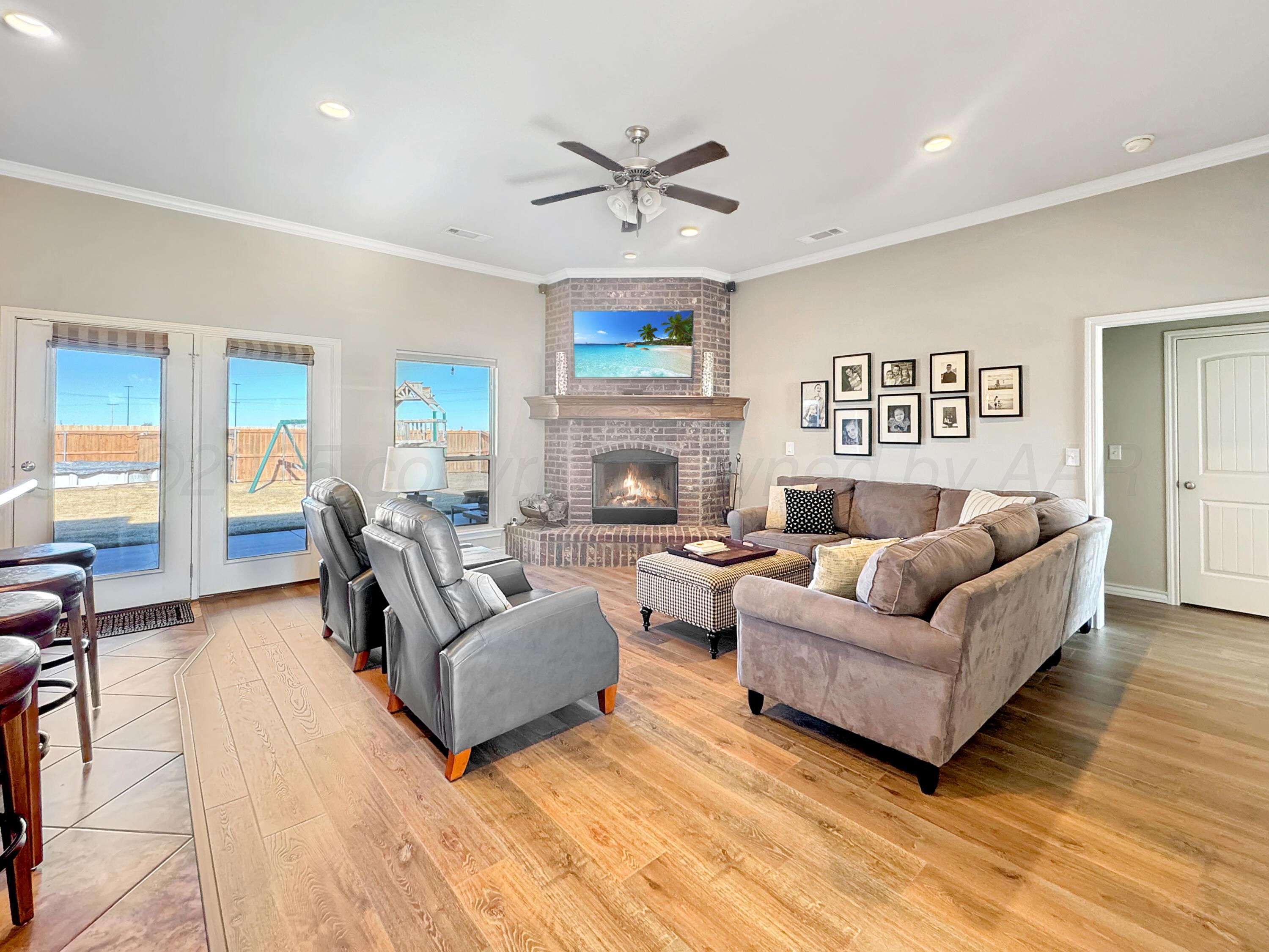 18500 Morning Star Road Bushland, TX 79124 - Photo 6 of 47 a living room with furniture and a large window