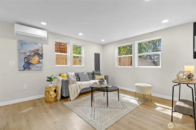 a living room with furniture and a window