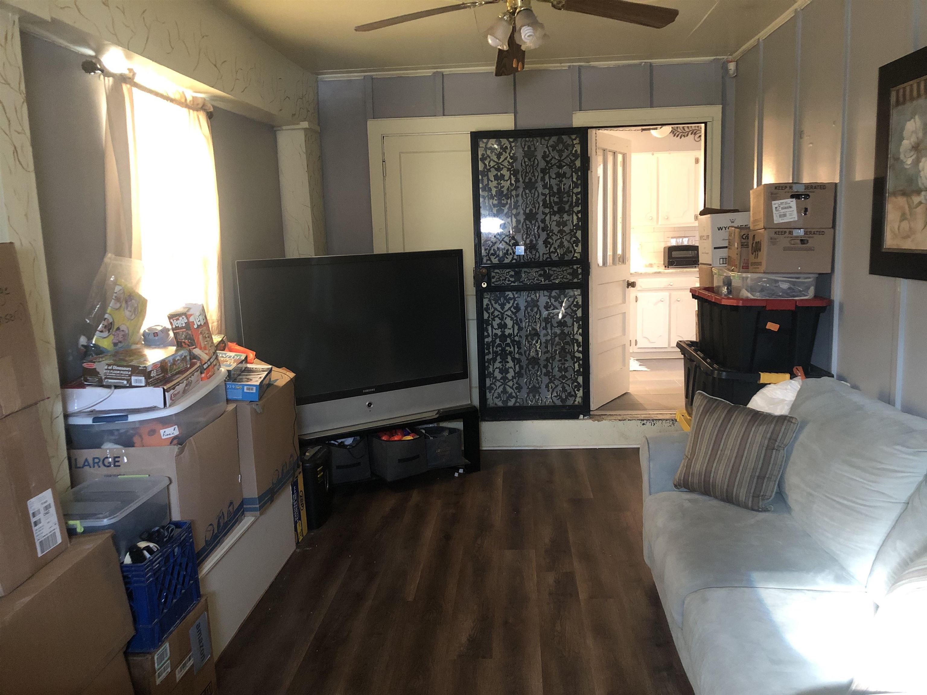1563 Railton Road Memphis, TN 38111 - Photo 14 of 17 Living room featuring ceiling fan and dark wood-style floors