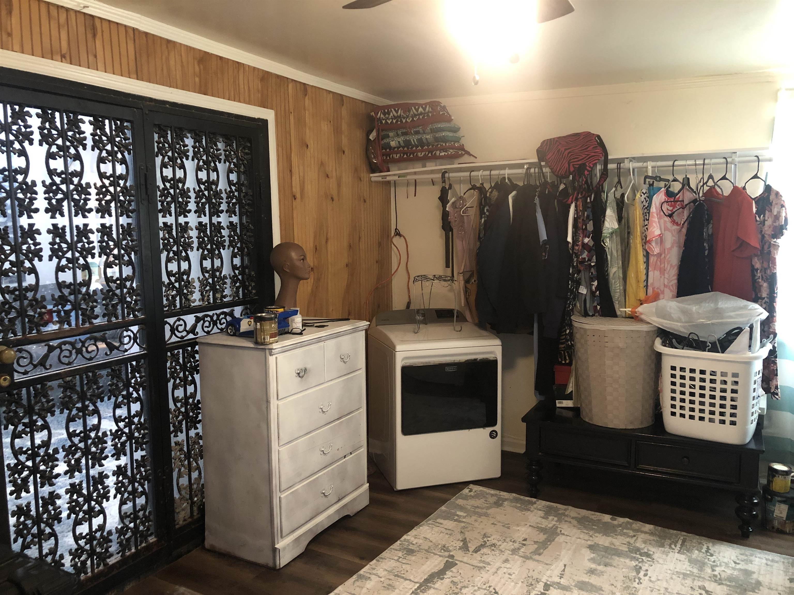 1563 Railton Road Memphis, TN 38111 - Photo 15 of 17 Walk in closet with washer / dryer, ceiling fan, and dark wood-style floors