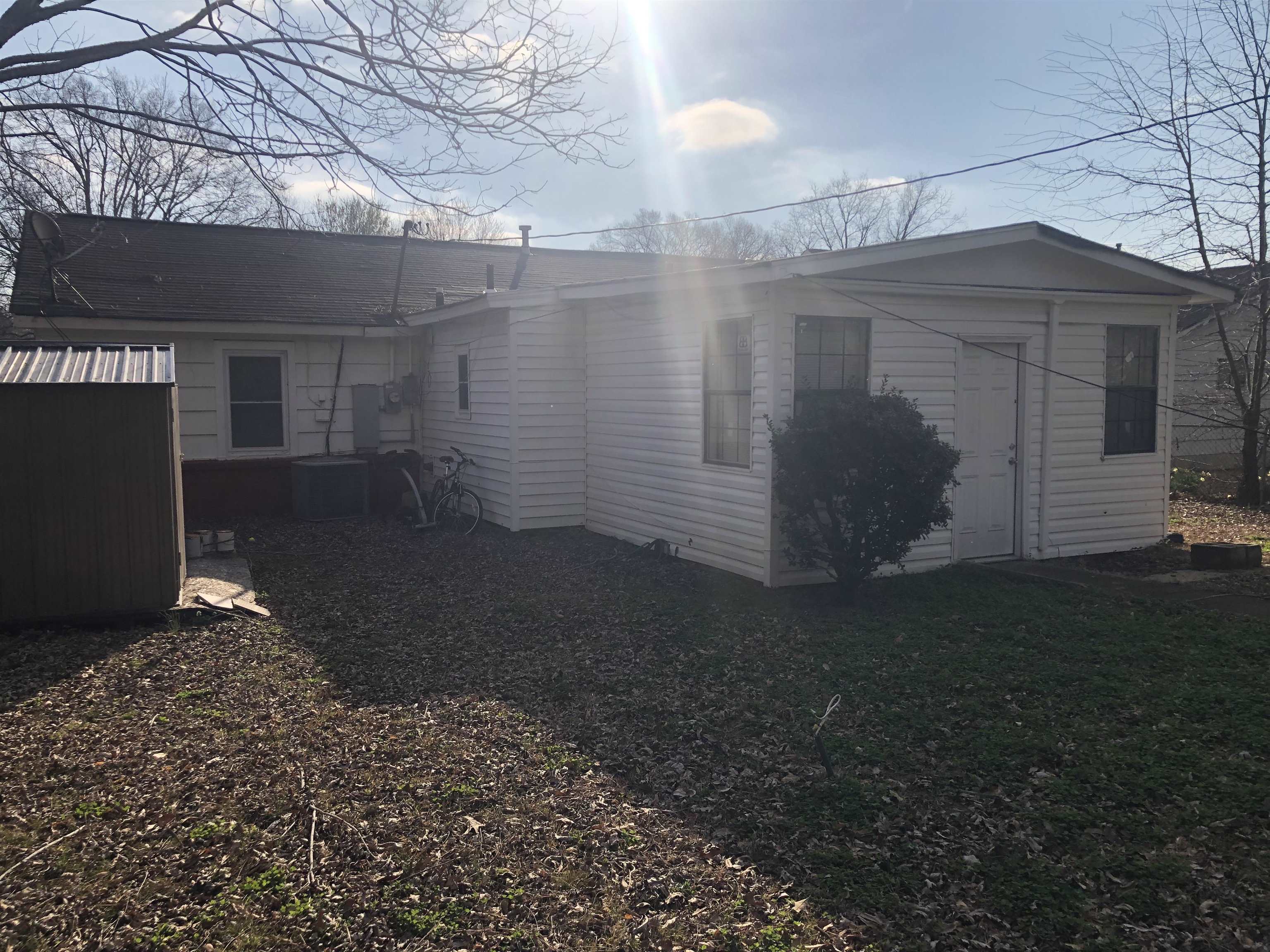 1563 Railton Road Memphis, TN 38111 - Photo 16 of 17 Back of house with a storage shed