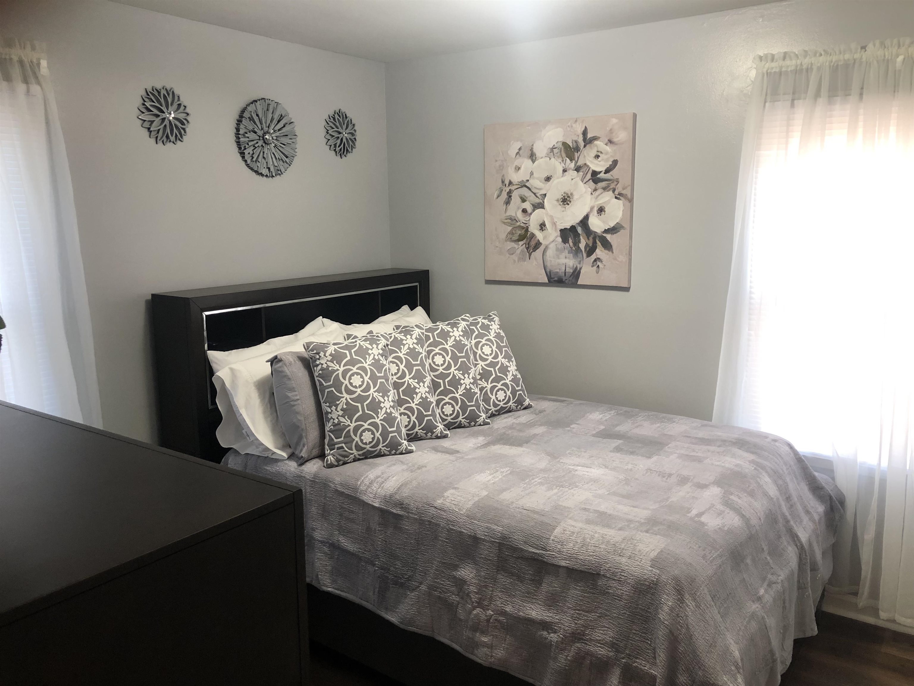 1563 Railton Road Memphis, TN 38111 - Photo 10 of 17 Bedroom featuring dark wood finished floors
