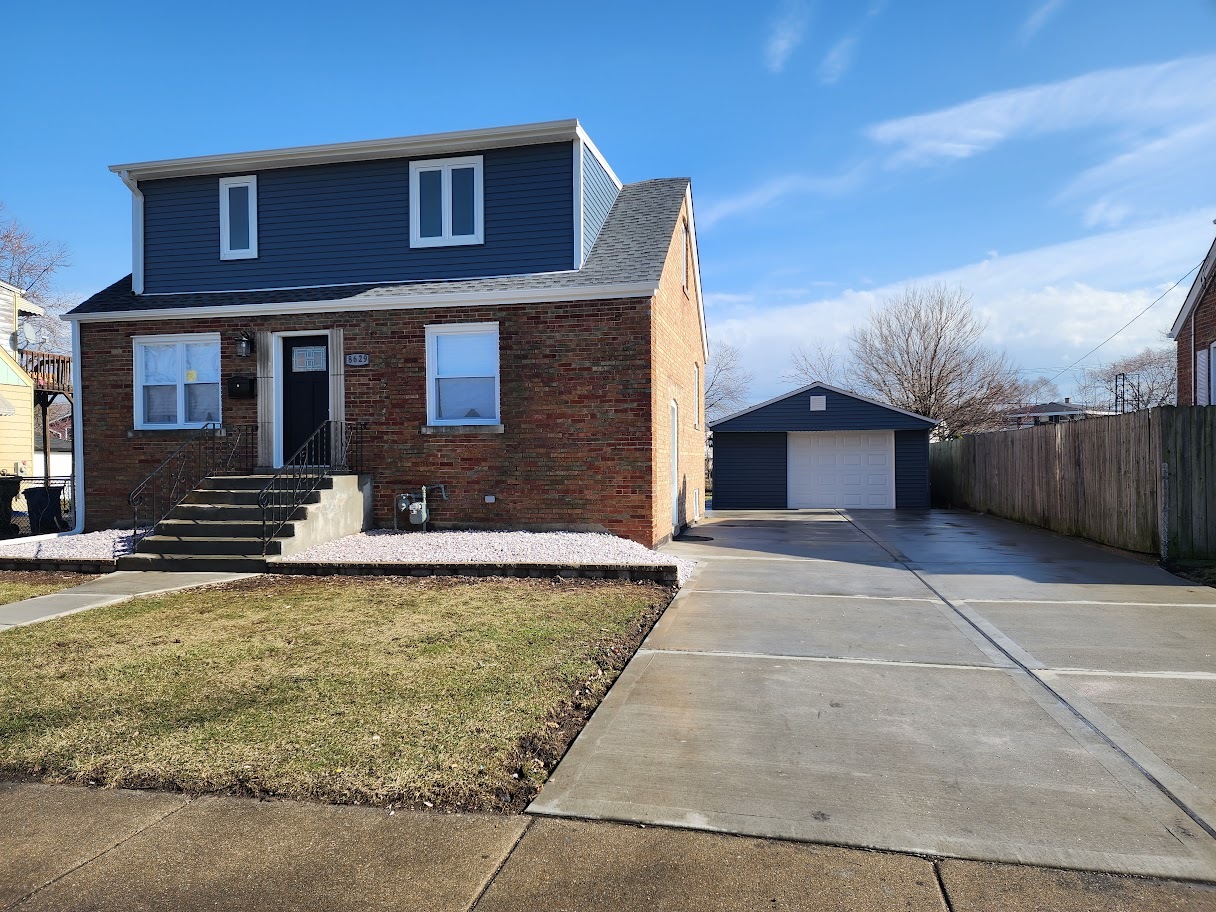 8629 State Road Burbank, IL 60459 - Photo 1 of 1 a view of a house with swimming pool in front of it