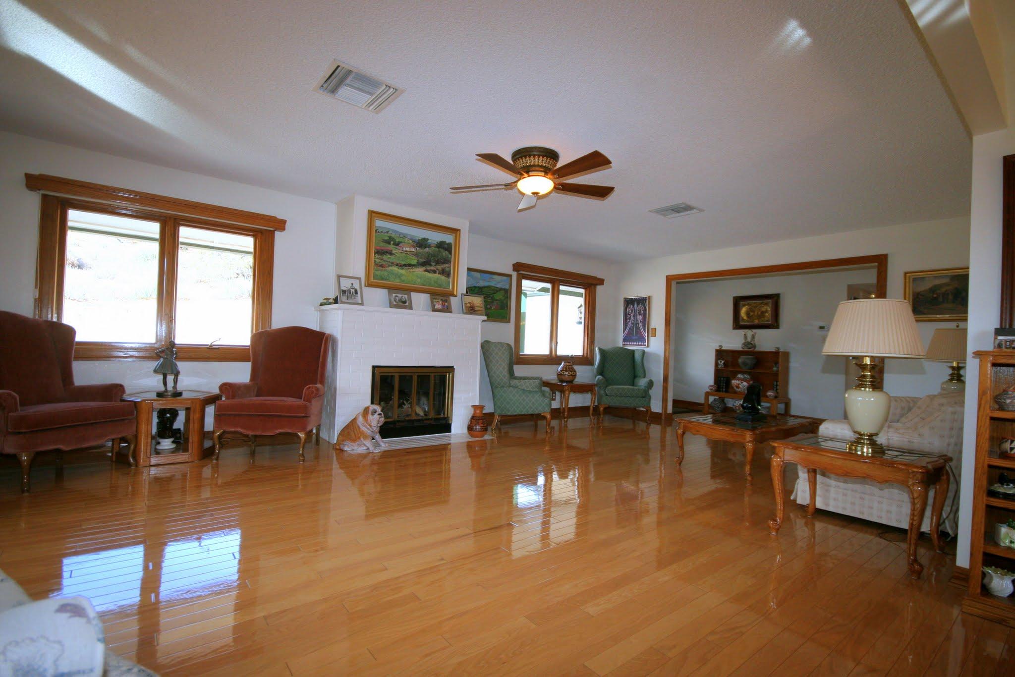 34421 Red Rover Mine Road Acton, CA 93510 - Photo 14 of 52 a living room with fireplace furniture and a wooden floor