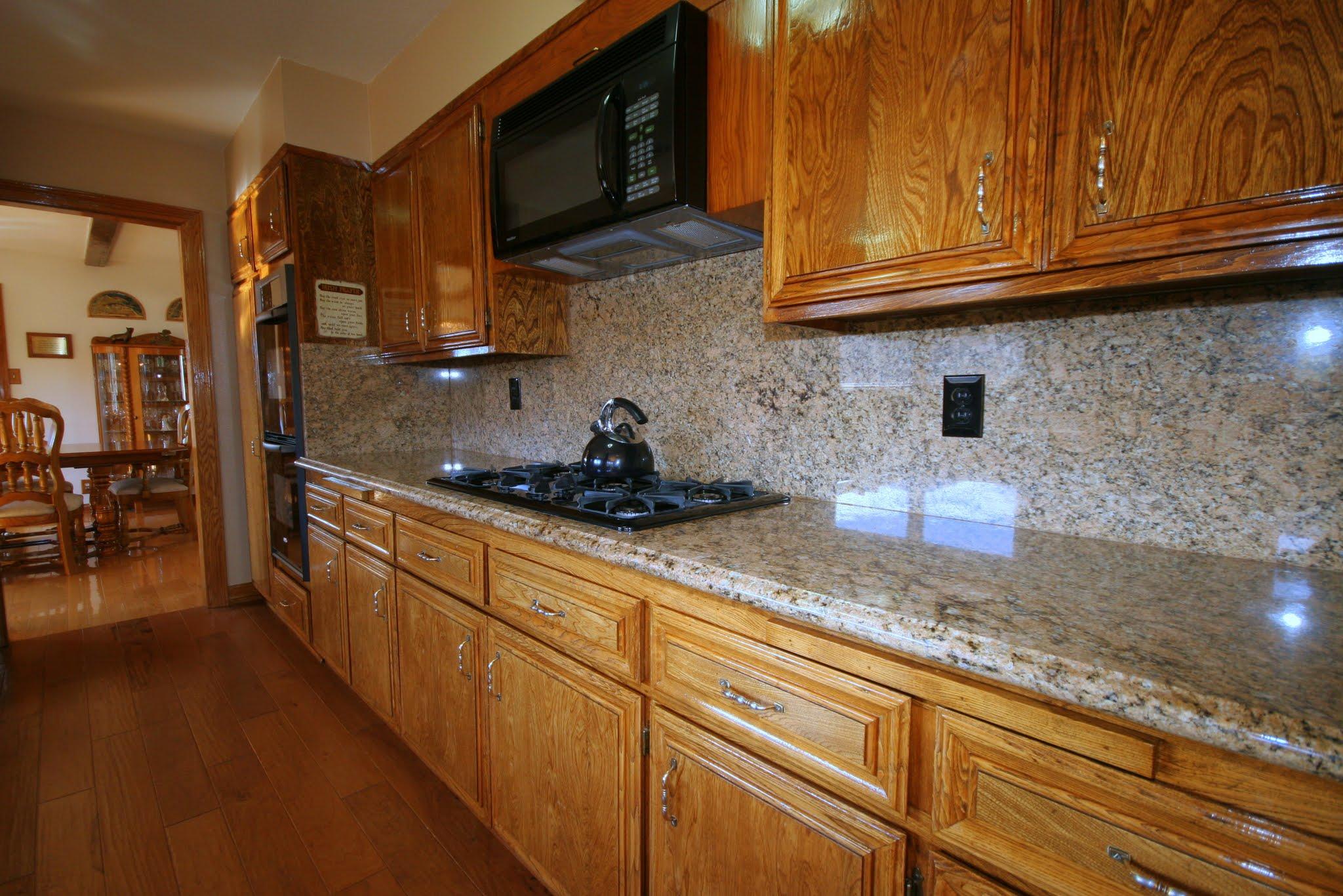 34421 Red Rover Mine Road Acton, CA 93510 - Photo 17 of 52 a kitchen with stainless steel appliances granite countertop a sink a stove top oven and granite counter tops