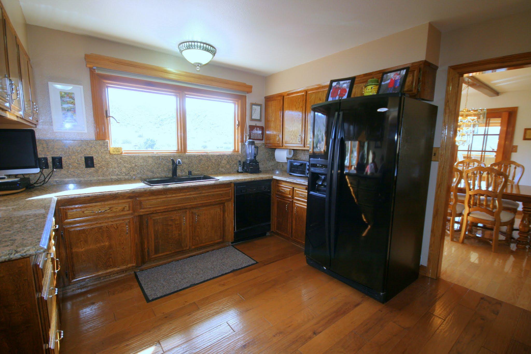 34421 Red Rover Mine Road Acton, CA 93510 - Photo 18 of 52 a kitchen with a sink appliances and cabinets