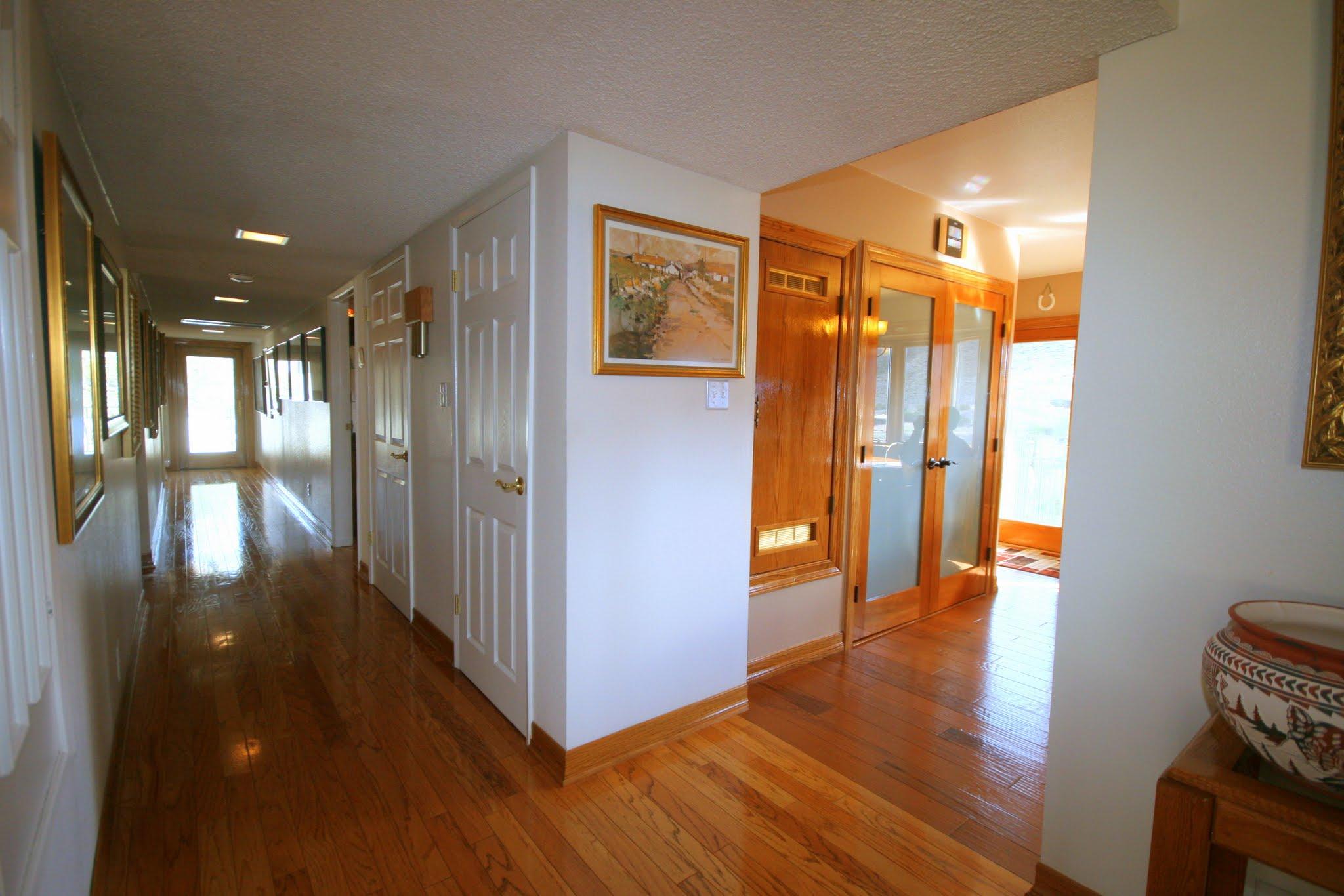 34421 Red Rover Mine Road Acton, CA 93510 - Photo 22 of 52 a view of hallway with furniture and wooden floor