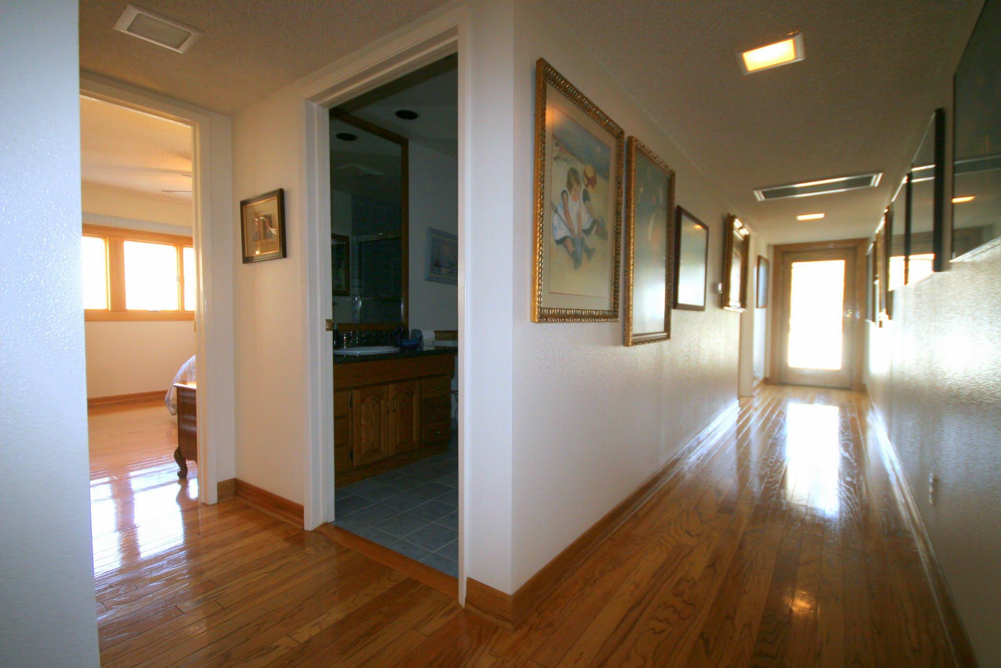 34421 Red Rover Mine Road Acton, CA 93510 - Photo 23 of 52 a view of hallway with furniture and wooden floor