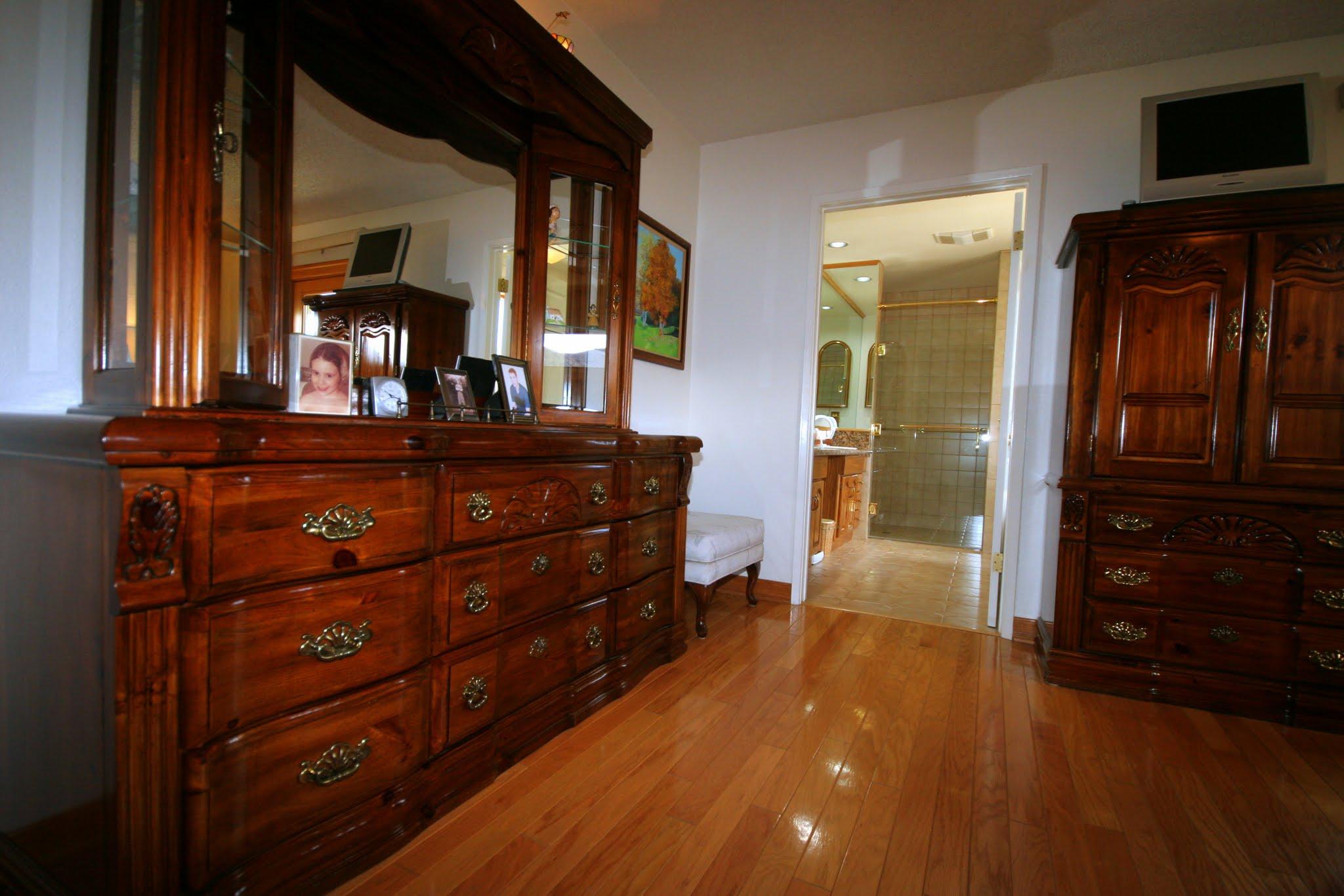 34421 Red Rover Mine Road Acton, CA 93510 - Photo 26 of 52 a room with a dresser and a mirror